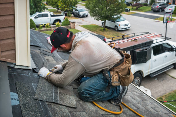 Professional Flat Roof Repair technician working in Oxford, ME